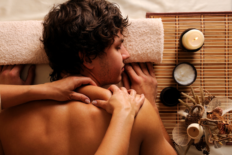 Header young man spa treatment recreation rest relaxation massage hygh angle view