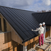 Art thumb full shot roofers working together with helmets